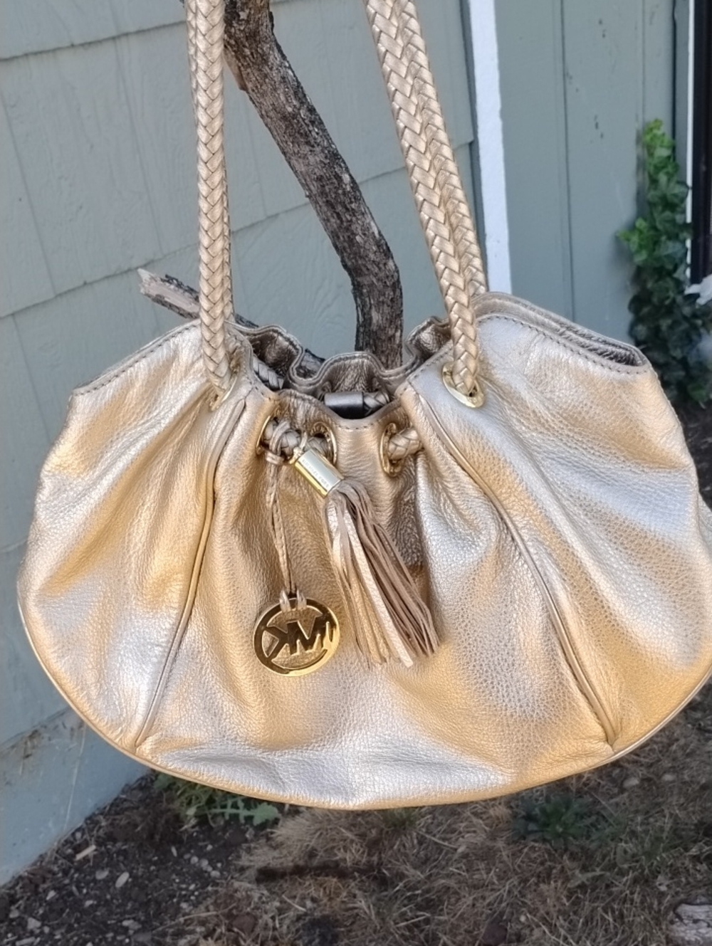 Michael Kors Shimmery Gold Leather Drawstring Shoulder Bag with Tassel